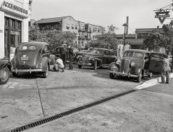 May 14, 1942. Washington, D.C. "Filling up with gas on the day before rationing starts." 4x5 inch acetate negative by John Collier for the Office of War Information. View full size.