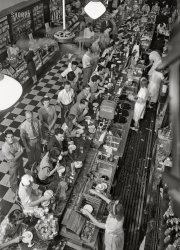 July 1942. Washington, D.C. "People's Drug store lunch counter on G Street N.W. at noon." Acetate negative by Marjory Collins for the Farm Security Administration. View full size.