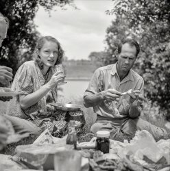 1940. "Farm family having Fourth of July fish fry along the Cane River near Natchitoches, Louisiana." Photo by Marion Post Wolcott. View full size.