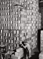 January 1942. "Petaluma, Sonoma County, California. Crates for eggs. Petaluma, which is the center of the intensive egg producing area, calls itself the world's egg basket." Medium format acetate negative by Russell Lee for the Farm Security Administration. View full size.