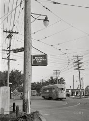 June-July 1942. "District of Columbia and Maryland boundary line at Wisconsin Avenue in the evening." Acetate negative by Marjory Collins for the Office of War Information. View full size.