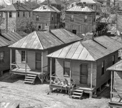 March 1936. "View in the Negro quarter. Vicksburg, Mississippi." 8x10 inch nitrate negative by Walker Evans for the U.S. Resettlement Administration. View full size.