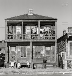 January 1936. "Negro house. New Orleans, Louisiana." The abode last glimpsed here. 8x10 inch nitrate negative by Walker Evans for the U.S. Resettlement Administration. View full size.