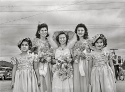 May 1942. "Portuguese-Americans in California. Irene Farias, who was queen of the Saint Jude Society of San Lorenzo, and her maids visit the Holy Ghost Festival at Novato. Miss Farias' mother was born in Portugal, her father in Honolulu." Photo by Russell Lee. View full size.