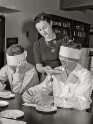 June 1942. "Experiments in dehydration at the U.S. Department of Agriculture Western Regional Agricultural Research Laboratory in Albany, California. Blindfold test for aroma of cooked dehydrated carrots." Acetate negative by Russell Lee. View full size.