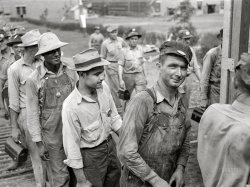 June 1942. "Wilson Dam, Alabama. Tennessee Valley Authority. Workers checking out at end of shift at a chemical engineering plant." Acetate negative by Arthur Rothstein. View full size.