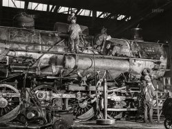 November 1942. "Chicago, Illinois. In the roundhouse at an Illinois Central Railroad yard. This former switching engine is being rebuilt for use on the road." Medium format acetate negative by Jack Delano for the Office of War Information. View full size.
