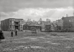 February 1942. "Detroit, Michigan. Looking towards downtown from the slum area in the early morning. These are conditions under which families lived before moving to the Sojourner Truth housing project." 4x5 acetate negative by Arthur Siegel for Life magazine. View full size.