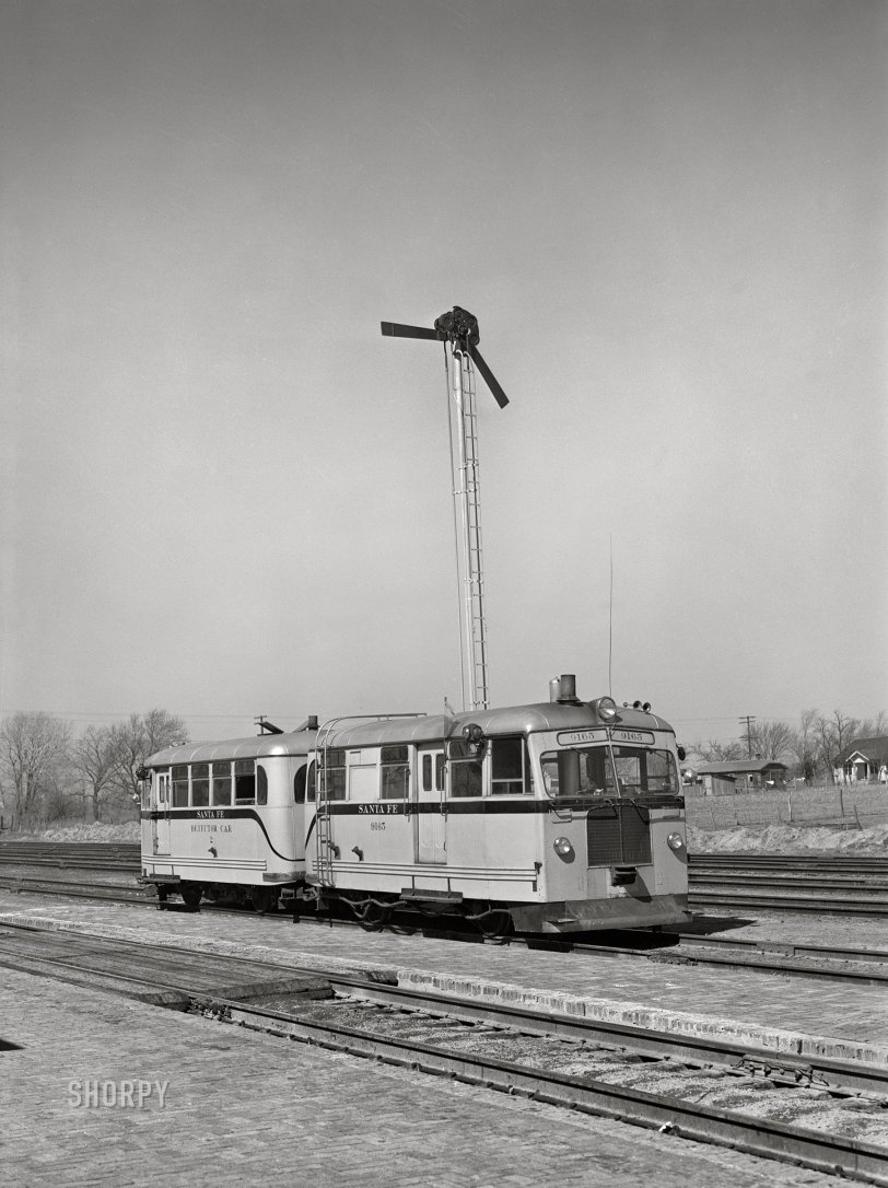 Defect Detective: 1943 March 1943. "Kiowa, Kansas. An Atchison, Topeka & Santa Fe rail detector car. These cars are actually traveling scientific instruments, which not only detect faulty rails but also record the place and extent of the defect." Photo by Jack Delano, Office of War Information. View full size.