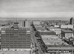 March 1943. "Amarillo, Texas. View over the city." The Fisk Building and South Polk Street. Acetate negative by Jack Delano for the Office of War Information. View full size.