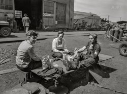 May 1943. "Bethlehem-Fairfield shipyards, Baltimore, Maryland. Women workers during lunch hour." Acetate negative by Arthur S. Siegel for the Office of War Information. View full size.
