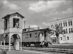 May 1943. "Beaumont, Texas. Wartime occupational replacement by women in men's traditional jobs. Lady in signal tower who operates block signals for railroad crossing." Medium format acetate negative by John Vachon for the Office of War Information. View full size.