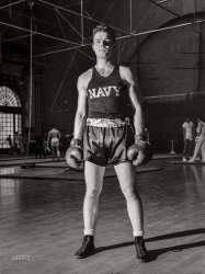 October 1942. "U.S. Naval Academy, Annapolis, Maryland. Boxing." Nitrate negative by Lieutenant Whitman for the Office of War Information. View full size.