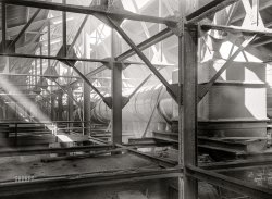September 1942. Deer Lodge County, Montana. "Smelter of the Anaconda Copper Mining Co. Flues atop the battery of roasting furnaces; sulphurous and arsenic gases are carried to the large smokestack." Acetate negative by Russell Lee, Office of War Information. View full size.