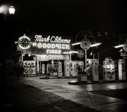 April 1942. "Hollywood, California. Gasoline filling station at night." Photo by Russell Lee for the Office of War Information. View full size.