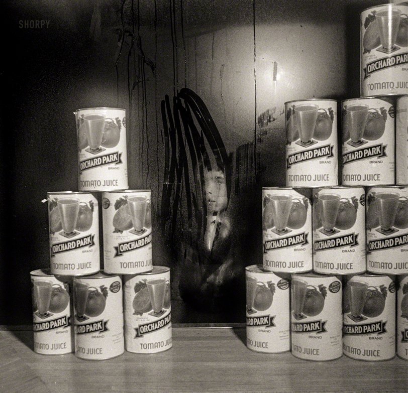 Orchard Park: 1943 May 1943. "Buffalo, New York. Peter Grimm, age 10 (last seen here), delivers for Loblaw's grocery store with his wagon. This was a rainy day with few customers. Sometimes Peter makes as much as $3 on a Saturday. He pays for all his school supplies and much of his clothing. His mother, a 26-year-old widow, is a crane operator at Pratt & Letchworth." Medium format negative by Marjory Collins for the Office of War Information. View full size.