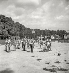 August 1943. "Middle River, a small crossroads in the vicinity of Baltimore, Maryland. Farm Security Administration housing project (later administered by the National Housing Agency) for Glenn L. Martin aircraft workers. Play period for children attending Bible class." Medium format negative by John Collier for the Office of War Information. View full size.