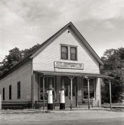 &nbsp; &nbsp; &nbsp; &nbsp; Two pumps, no waiting.
September 1943. "Gas station on the bus route between Columbus and Cincinnati." Photo by Esther Bubley for the Office of War Information. View full size.