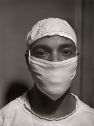 March 1942. "Chicago, Illinois. Provident Hospital. Dr. S.J. Jackson, intern, ready to assist in an operation." Acetate negative by Jack Delano for the Office of War Information. View full size.