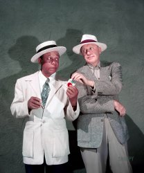 January 1950. "Comedian Jack Benny with Eddie Anderson, who plays the character of Rochester, his valet, on the Jack Benny radio program." And, later in 1950, on his CBS television show. Color transparency by Frank Bauman for Look magazine. View full size.