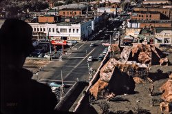 The latest dispatch from Don Cox is this Kodachrome dated October 1958. Judging by the mayhem on the roof below I'd say we're somewhere in the Wild, Wild West, where the men are men and the Thunderbirds are pink. (Yes, it's Reno. Also: Cash for Cars!) View full size.