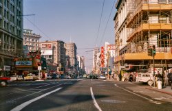 April 1963. The latest from Don Cox is this Kodachrome of Market Street at Sixth in San Francisco. Now playing at the Loew's Warfield: two 1951 films, "The Great Caruso" and "Show Boat." Across the street: Charlton Heston in the more recent "Diamond Head." View full size.
