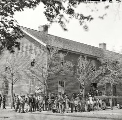 April 1865. "Richmond, Va. Crowd before headquarters of the U.S. Christian Commission." An offshoot of the YMCA that provided medical and spiritual support to Union troops during the Civil War. Wet plate negative. View full size.