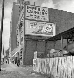The location: Fourth Avenue North in Birmingham, Alabama.
1951. "Segregation in the South." Which extended, evidently, even to pillowcases. Photo by John Vachon for the Look magazine article "How Far From Slavery?" Who'll be the first person to tell us where this might be? View full size.