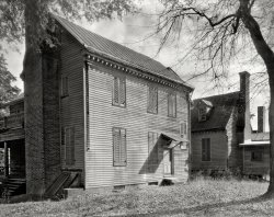 Pittsylvania County, Virginia, circa 1935. "Berry Hill, Danville vicinity. Related names: Mrs. Simms. Built in three units -- in 1776, in 1812, and in 1850 -- by the Perkins family. The later building was done under the direction of Maj. Wilson, who married Peter Perkins' granddaughter. Used as a hospital by Continental Army in 1781." 8x10 negative by Frances Benjamin Johnston. View full size.