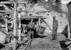 December 1910. "Hard work and dangerous for such a young boy. James O'Dell, a greaser and coupler on the tipple of the Cross Mountain Mine, Knoxville Iron Co., in the vicinity of Coal Creek, Tennessee. James has been here four months. Helps push these heavily loaded cars. Appears to be about 12 or 13 years old." Photo by Lewis Wickes Hine for the National Child Labor Committee. View full size.
