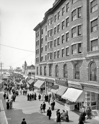 The Jersey shore circa 1904. "Young's Hotel and Boardwalk, Atlantic City." Where strollers confront a plenitude of amusements, confections and refreshments. 8x10 inch dry plate glass negative, Detroit Publishing Company. View full size.