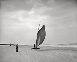 Circa 1905. "Sailing on the beach -- Ormond, Florida." It'll never take off. 8x10 inch dry plate glass negative, Detroit Publishing Company. View full size.
