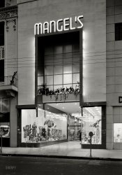 January 21, 1942. "Mangel's, 130 E. Flagler Street, Miami, Florida. Exterior, night. Ross-Frankel Inc., client; Morris Lapidus, architect." Note the ghost pedestrians. Large-format acetate negative by Gottscho-Schleisner. View full size.