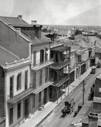 New Orleans circa 1923. "View of a street and roofs." Also an ice wagon whose horse is wearing a hat. Bonus points if you can identify the street. Nitrate negative by Arnold Genthe. View full size.