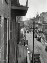 &nbsp; &nbsp; &nbsp; &nbsp; Thanks to our commenters, we've zeroed in on the location: the 500 block of Royal Street.
Circa 1923. "Street scene, New Orleans." Who can name the street? It has a nice view of the Hibernia Bank tower. Photo by Arnold Genthe. View full size.