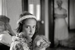 Summer 1938. "Daughter of Virgil Thaxton, farmer, near Mechanicsburg, Ohio." Photo by Ben Shahn for the Farm Security Administration. View full size.