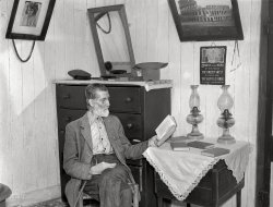 October 1935. "Interior of Postmaster Brown's home at Old Rag. Shenandoah National Park, Virginia." Photo by Arthur Rothstein for the FSA. View full size. 