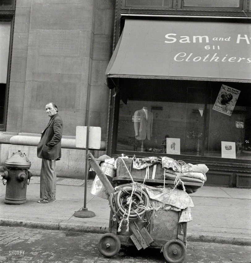 Manhattan Hobo: 1942 New York, 1942. "Street vagrant pushcart." Who'll be first to pinpoint the location? Photo by Marjory Collins for the Office of War Information. View full size.