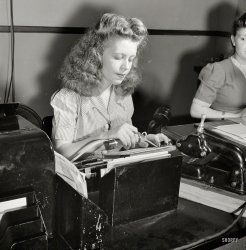 &nbsp; &nbsp; &nbsp; So many of you guessed correctly on this one that we're not going to wait till tomorrow for the answer -- the lady's job is: Telegram gummer. Original caption for the photo, taken by Esther Bubley: "June 1943. Miss Kathleen McCarthy, a Western Union teleprinter operator, gumming telegraph messages."

The year is 1943 and the place is Washington, D.C. What is this girl doing? (Hint: Hundreds if not thousands of people had the same job over the course of many years.) Check back on Sunday for the answer. View full size.