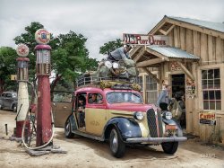 June 1940. "Stage in front of the post office at Pie Town, New Mexico. This stage comes through daily except Sunday. It takes in cream for the Pie Town farmers to Magdalena and Socorro and then returns the empty cans." Photo by Russell Lee.

Colorized version of this Shorpy old photo. View full size.
