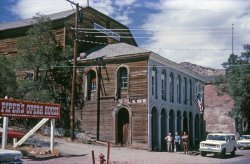 This time I was almost literally in Arthur Rothstein's footsteps when I took my Kodachrome slide of Virginia City's Piper's Opera House in August 1966, 26 years and some months after he was clicking his shutter. Had my family been there for him as they were for me, my father would have been 38, my mother 31 and my brother 2 going on 3. It would be another six years before they would be blessed by my existence. The photobombing International Scout wasn't the family car; our new Rambler wagon was parked some blocks away. View full size.